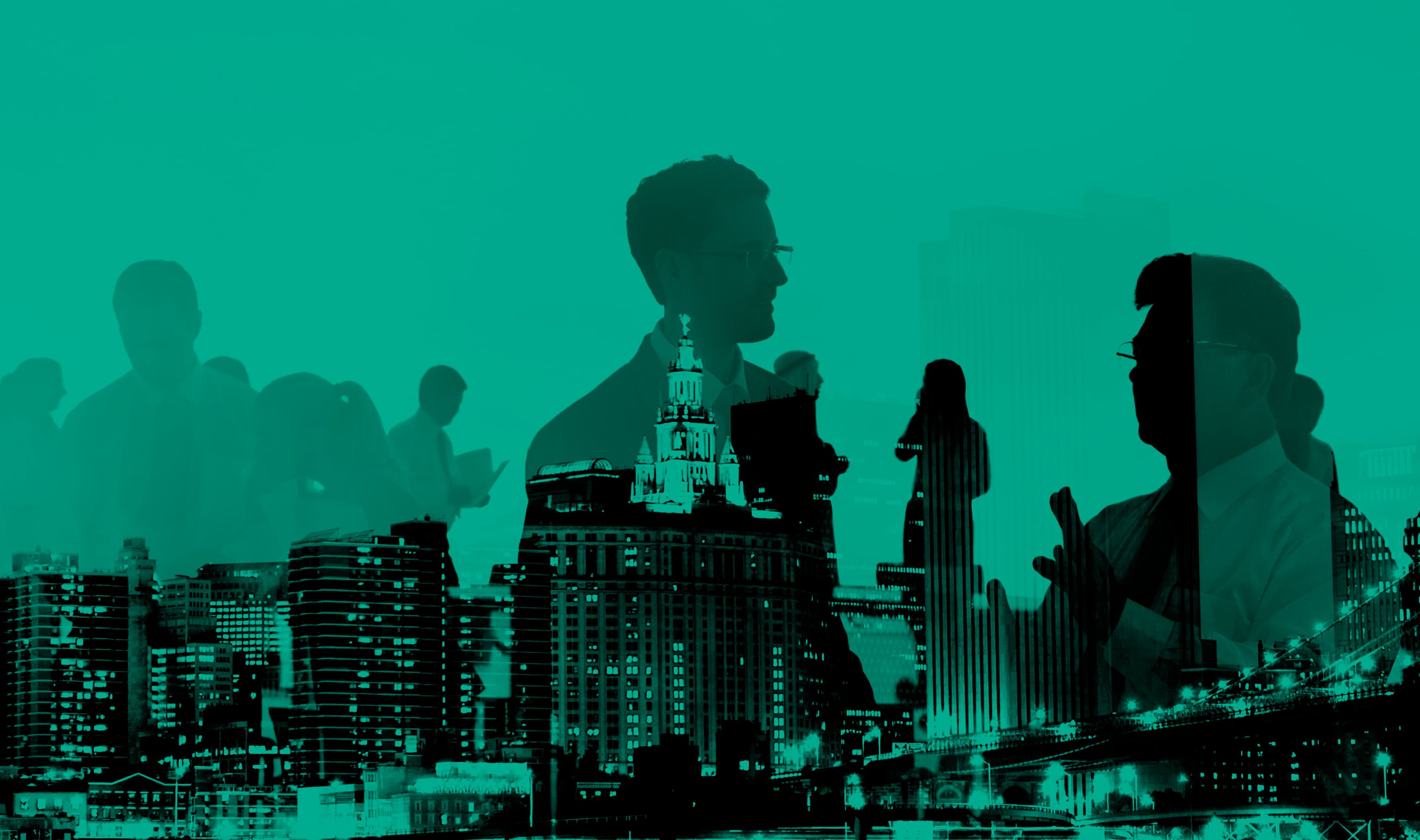 Double-exposure image of a city skyline and business figures in conversation